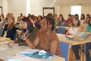 Stellenbosch University Journalism student, Millie Phiri, poses a question at one of the plenary sessions