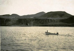 The Natal's motor boat in Cave Bay, Prince Edward Island, 20 April 1950. The cave where the occupation flag was flown is visible occuaption 