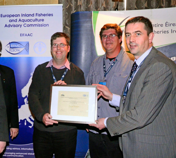 SAIAB/CIB Postdoctoral fellow Dr Darragh Woodford is presented the EIFAAC award for best poster at the FINS conference