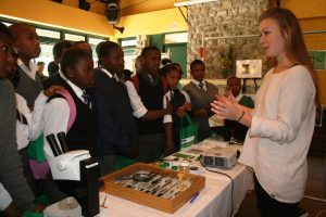 Sophia Turner of the Iimbovane Outreach Project explaining to a group of learners the importance of biodiversity and telling learners about possible careers in biodiversity science